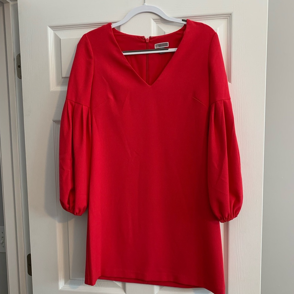 Long sleeve, red, above-the-knee dress. Size 4. Great condition, worn one time.